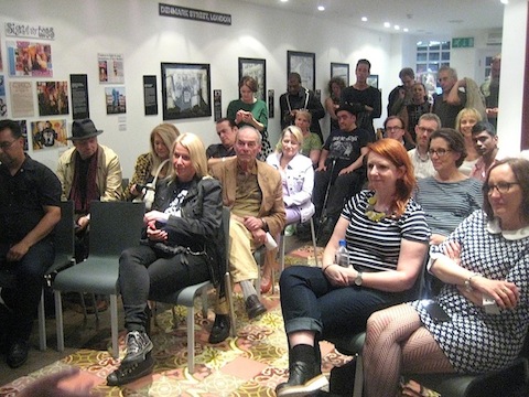 A packed gallery listening to stories about Johnsons and La Rocka!